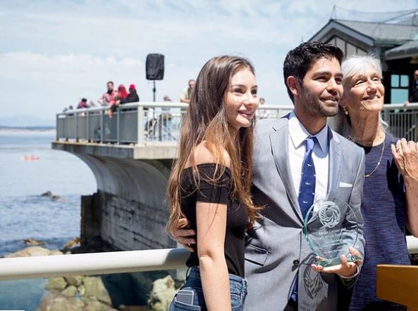 Photo: Meadow Walker (left) presenting Adrian Greiner (in the middle) with the Paul Walker Foundation Award for his work on The Lonely Whale Foundation